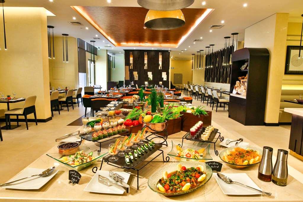 Four Points By Sheraton Production City, Dubái Restaurante foto