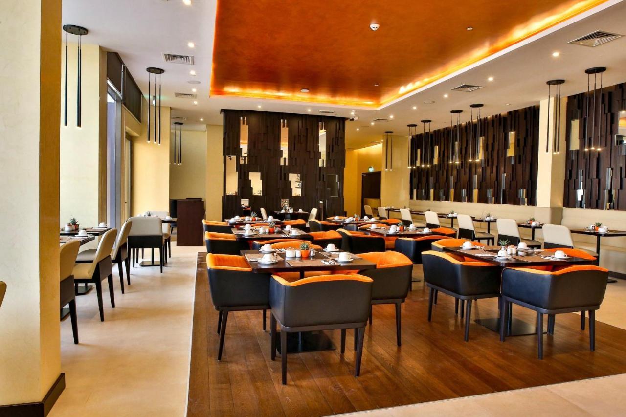 Four Points By Sheraton Production City, Dubái Exterior foto